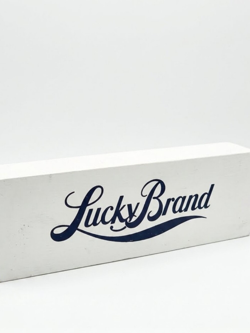 Lucky Brand White Sign with Navy Script